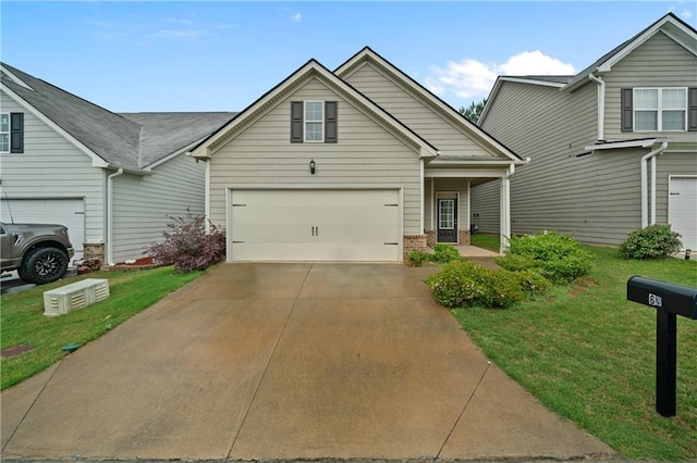 61 Castlemoor Loop, Adairsville, GA 30103 - townhome / multi-family property with brick siding, a front lawn, and driveway