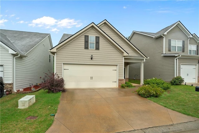 61 Castlemoor Loop, Adairsville, GA 30103 - view of front of property featuring brick siding, a front yard, and concrete driveway