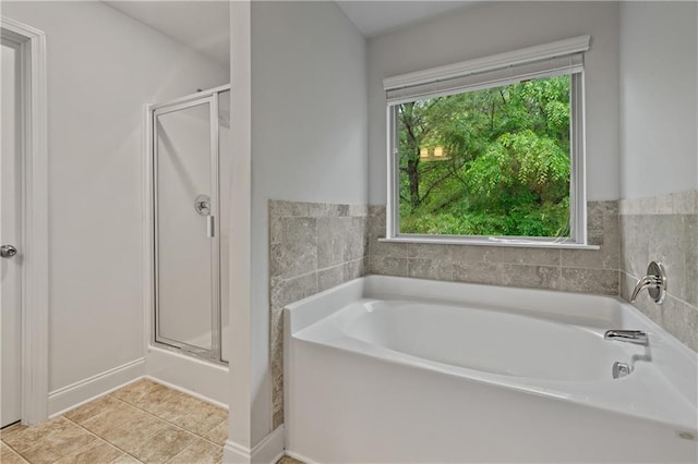61 Castlemoor Loop, Adairsville, GA 30103 - bathroom with a bath, tile patterned floors, and a stall shower