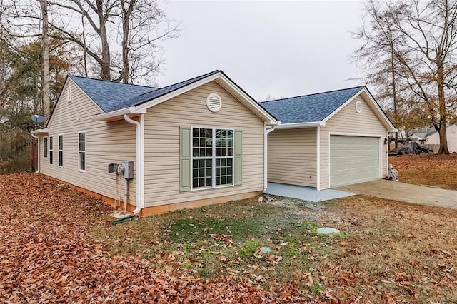 view of home's exterior featuring a garage