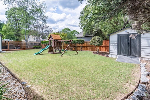 220 Chandler Ct, Sugar Hill, GA 30518 - fenced backyard featuring a playground and a shed