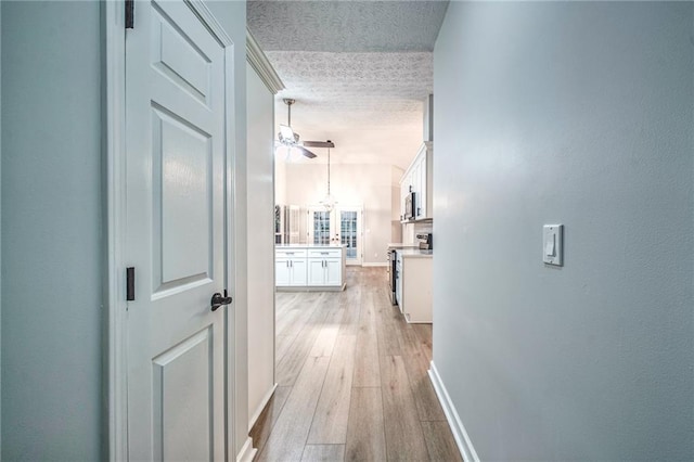 220 Chandler Ct, Sugar Hill, GA 30518 - hallway with a textured ceiling and light wood-type flooring
