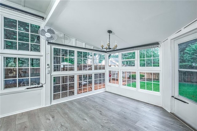 220 Chandler Ct, Sugar Hill, GA 30518 - unfurnished sunroom with a chandelier, healthy amount of natural light, and vaulted ceiling