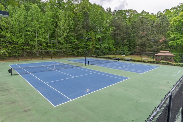 220 Chandler Ct, Sugar Hill, GA 30518 - view of tennis court featuring a gazebo, a forest view, and community basketball court