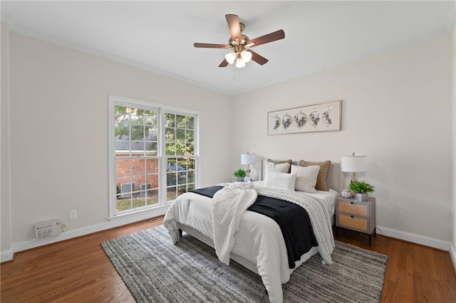 735 River Ridge Lane, Suwanee, GA 30024 - bedroom featuring ornamental molding, wood finished floors, baseboards, and ceiling fan