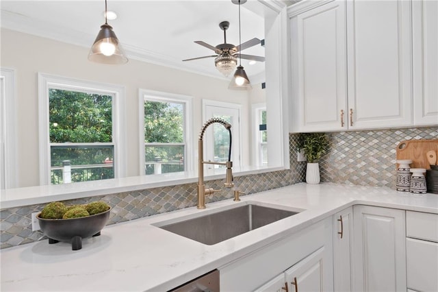 735 River Ridge Lane, Suwanee, GA 30024 - kitchen with a sink, tasteful backsplash, white cabinets, crown molding, and light stone countertops