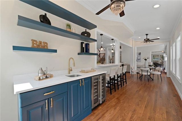 735 River Ridge Lane, Suwanee, GA 30024 - indoor wet bar featuring ceiling fan, wine cooler, crown molding, recessed lighting, and wood finished floors