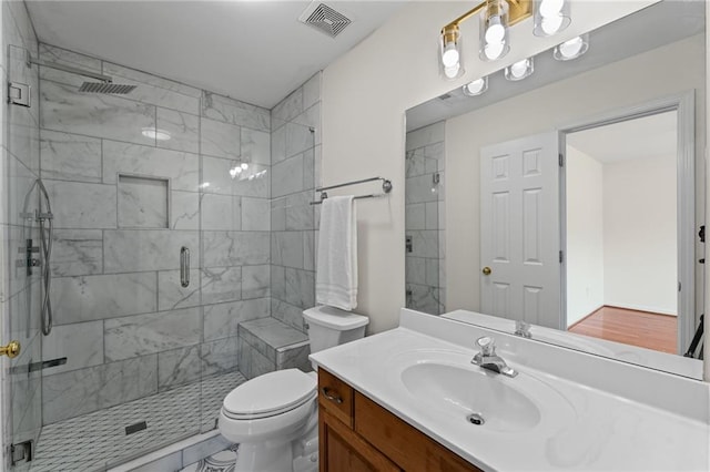 735 River Ridge Lane, Suwanee, GA 30024 - full bathroom featuring vanity, a stall shower, and toilet