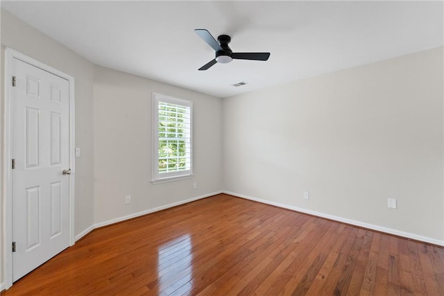 735 River Ridge Lane, Suwanee, GA 30024 - spare room featuring hardwood / wood-style flooring, baseboards, and a ceiling fan