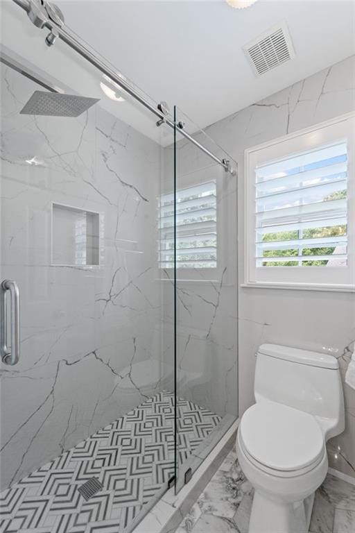 735 River Ridge Lane, Suwanee, GA 30024 - full bath featuring a marble finish shower, toilet, and marble finish floors
