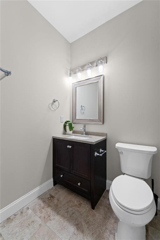 735 River Ridge Lane, Suwanee, GA 30024 - half bath with vanity, baseboards, toilet, and tile patterned flooring