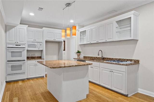 735 River Ridge Lane, Suwanee, GA 30024 - kitchen with white appliances, ornamental molding, white cabinetry, light wood finished floors, and recessed lighting