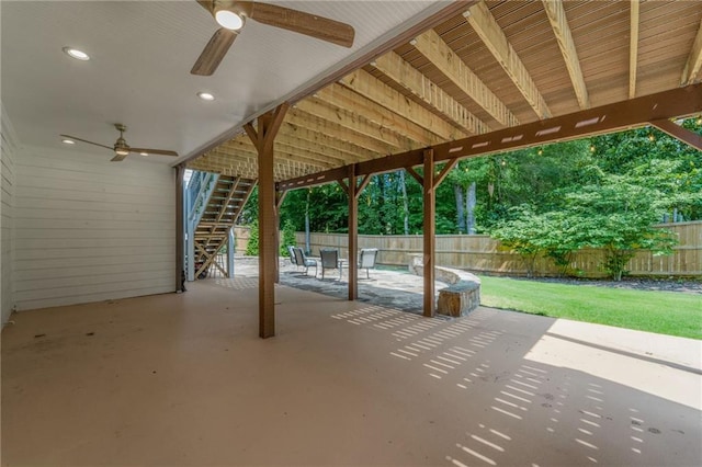 735 River Ridge Lane, Suwanee, GA 30024 - fenced backyard featuring stairs, ceiling fan, and a patio