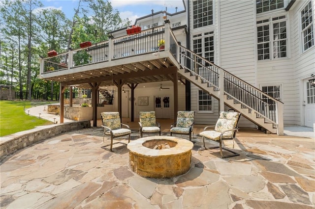 735 River Ridge Lane, Suwanee, GA 30024 - view of patio featuring a fire pit, stairs, and a deck