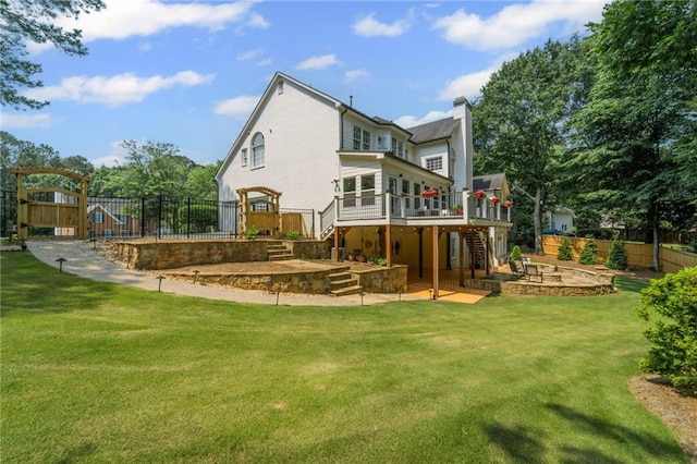 735 River Ridge Lane, Suwanee, GA 30024 - back of house with stairway, a wooden deck, a patio, and a chimney