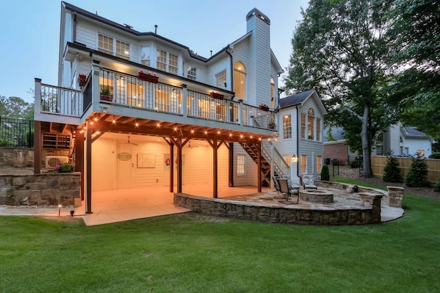 735 River Ridge Lane, Suwanee, GA 30024 - rear view of property featuring a patio, stairs, an outdoor fire pit, a deck, and a chimney