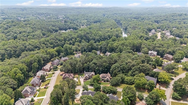735 River Ridge Lane, Suwanee, GA 30024 - aerial view of residential area featuring a forest