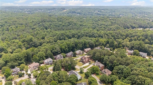 735 River Ridge Lane, Suwanee, GA 30024 - aerial view of property and surrounding area featuring a forest and nearby suburban area