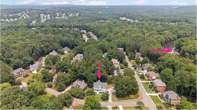 735 River Ridge Lane, Suwanee, GA 30024 - aerial view of residential area with a heavily wooded area