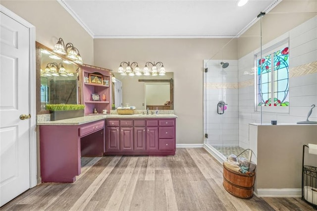 bathroom featuring wood-type flooring, ornamental molding, and an enclosed shower