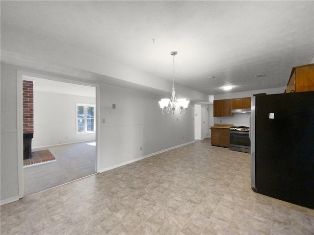 empty room with a textured ceiling and hardwood / wood-style flooring