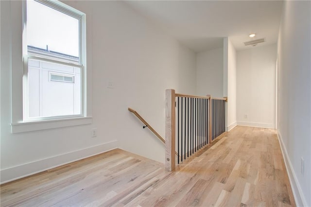 interior space featuring a wealth of natural light and light hardwood / wood-style flooring