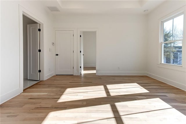 unfurnished room featuring light hardwood / wood-style flooring