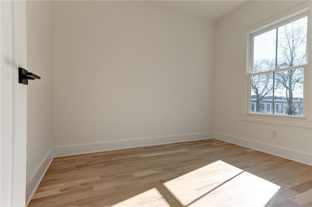 empty room featuring light hardwood / wood-style floors