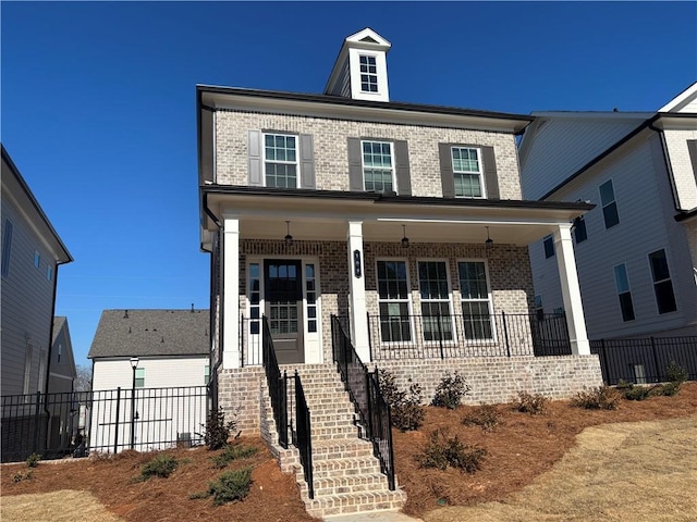175 Basil St, Cumming, GA 30040 - view of front of property featuring brick siding, a porch, and stairs