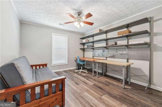 2350 Laurel Pointe Ln, Lawrenceville, GA 30043 - bedroom featuring wood finished floors, baseboards, crown molding, and a textured ceiling