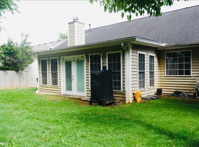 2350 Laurel Pointe Ln, Lawrenceville, GA 30043 - rear view of property with a chimney and a shingled roof
