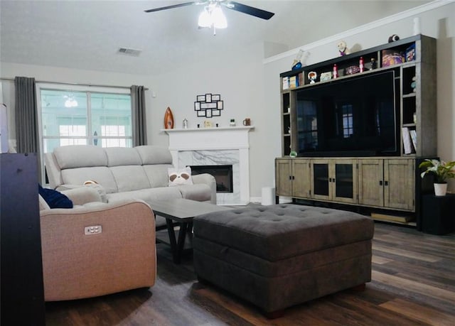 2350 Laurel Pointe Ln, Lawrenceville, GA 30043 - living area featuring dark wood finished floors, ceiling fan, and a fireplace
