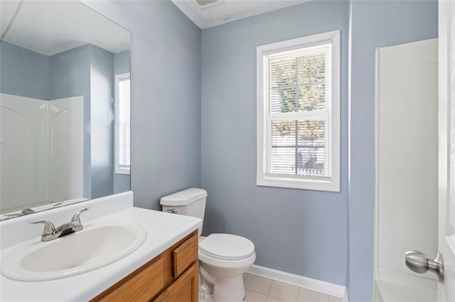 full bathroom featuring vanity, tub / shower combination, tile patterned floors, and toilet