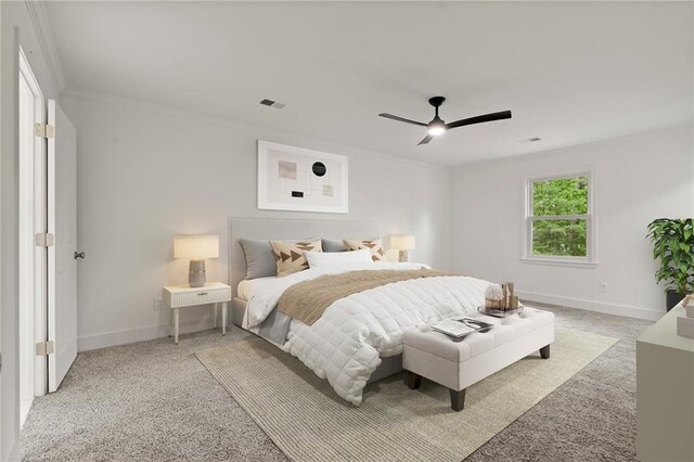 bedroom featuring light colored carpet, a ceiling fan, baseboards, and visible vents