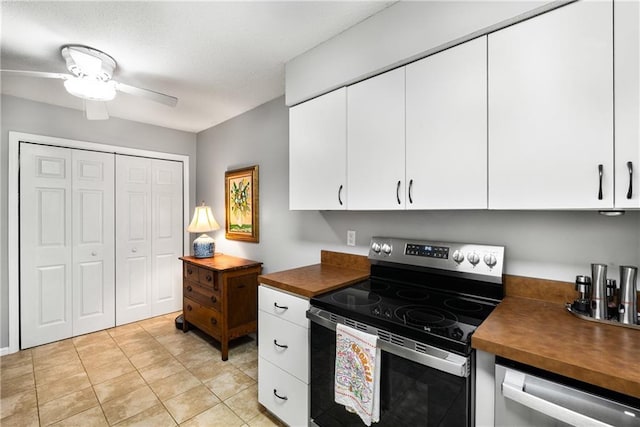 2349 Northlake Ct NE, Atlanta, GA 30345 - kitchen with stainless steel appliances, white cabinetry, ceiling fan, wooden counters, and light tile patterned floors