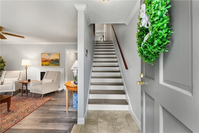 2349 Northlake Ct NE, Atlanta, GA 30345 - staircase with ceiling fan, ornamental molding, and baseboards