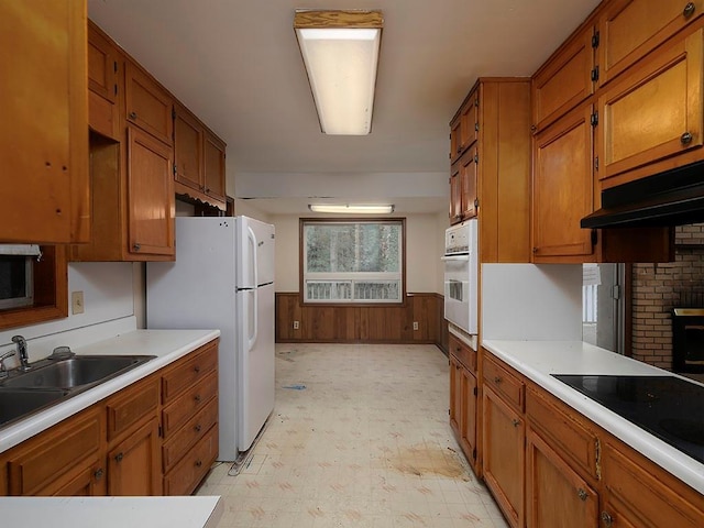 4135 Sunrise Trl, Atlanta, GA 30349 - full bathroom with tile walls, a tile shower, toilet, and wainscoting