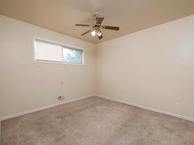 4135 Sunrise Trl, Atlanta, GA 30349 - kitchen with white appliances, brown cabinets, light flooring, wainscoting, and wooden walls