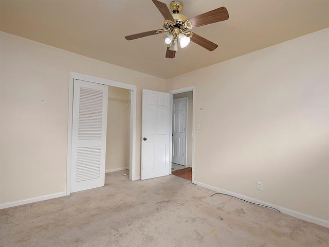4135 Sunrise Trl, Atlanta, GA 30349 - unfurnished bedroom with baseboards, carpet flooring, a closet, and ceiling fan