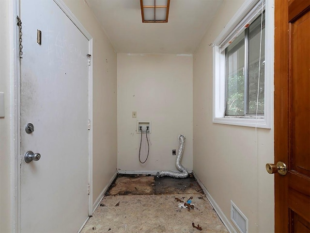 4135 Sunrise Trl, Atlanta, GA 30349 - laundry area featuring hookup for a washing machine, baseboards, and electric dryer hookup