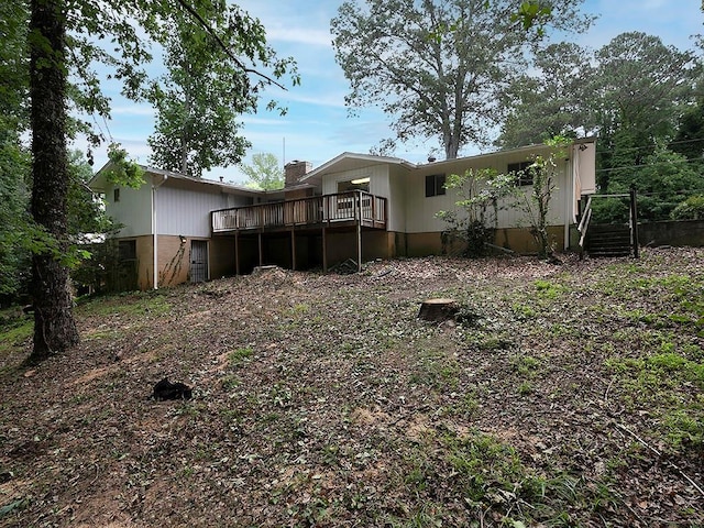4135 Sunrise Trl, Atlanta, GA 30349 - rear view of house featuring a deck and a chimney