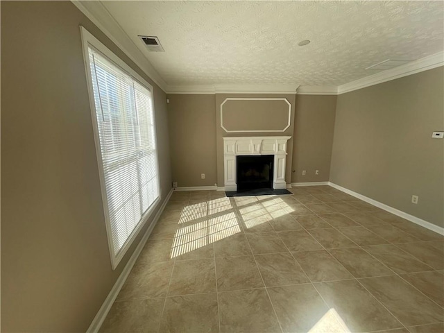 unfurnished living room featuring ornamental molding, a textured ceiling, and light tile patterned floors