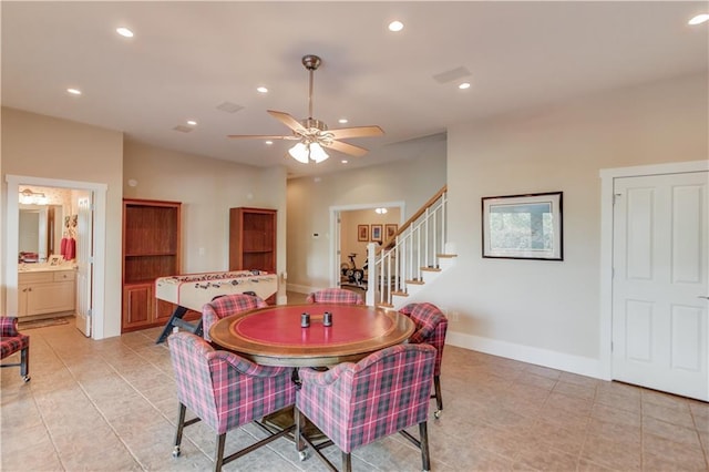 dining room featuring stairway, recessed lighting, and light tile patterned floors