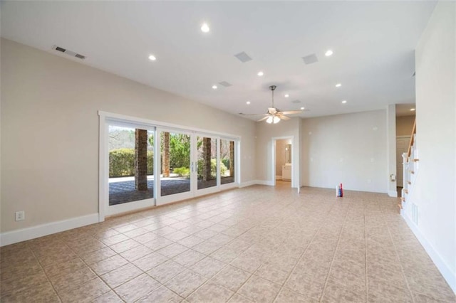 unfurnished room featuring visible vents, baseboards, recessed lighting, ceiling fan, and stairs