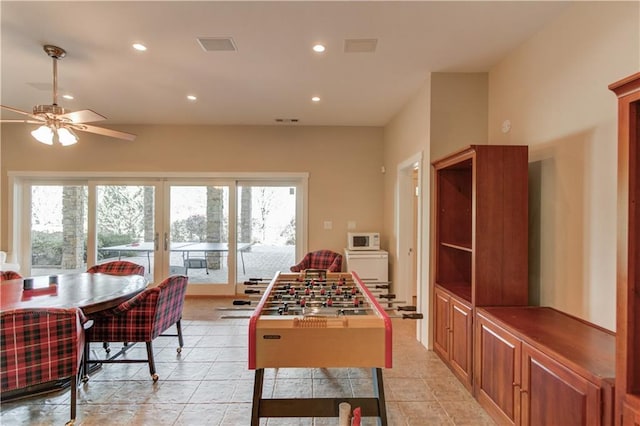 game room with recessed lighting, plenty of natural light, french doors, and ceiling fan