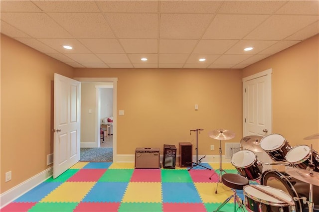 rec room featuring a paneled ceiling, baseboards, tile patterned floors, recessed lighting, and visible vents