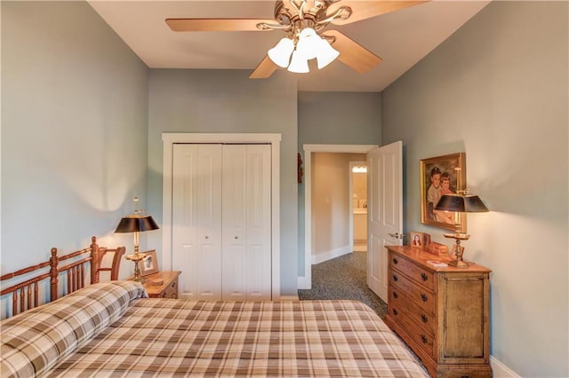 bedroom with a closet, baseboards, a ceiling fan, and carpet flooring