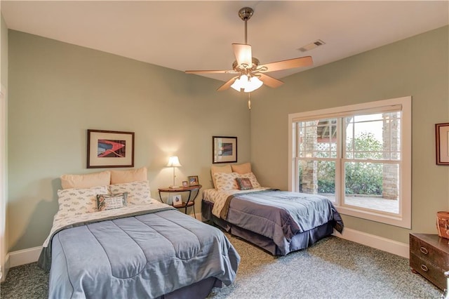 1126 Shoreline Dr, Jefferson, GA 30549 - bedroom featuring baseboards, carpet flooring, and ceiling fan
