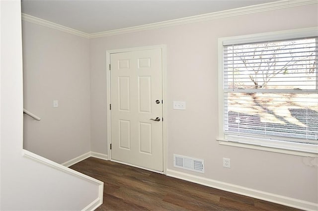 8310 Jensen Trl, Gainesville, GA 30506 - foyer entrance featuring healthy amount of natural light, wood finished floors, ornamental molding, and baseboards