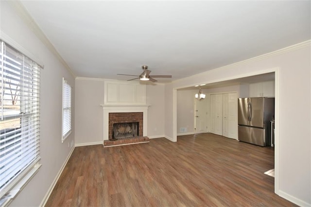 8310 Jensen Trl, Gainesville, GA 30506 - unfurnished living room featuring ceiling fan, wood finished floors, crown molding, baseboards, and a fireplace
